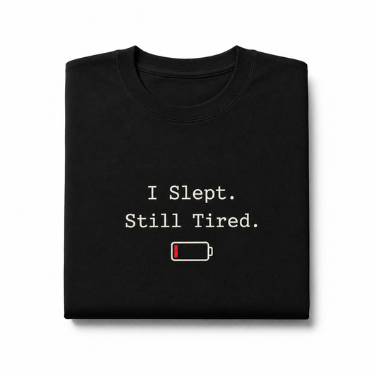 I Slept Still Tired T-Shirt for Men & Women | Funny Low Battery Graphic Tee | Relatable Sleep Humor Shirt